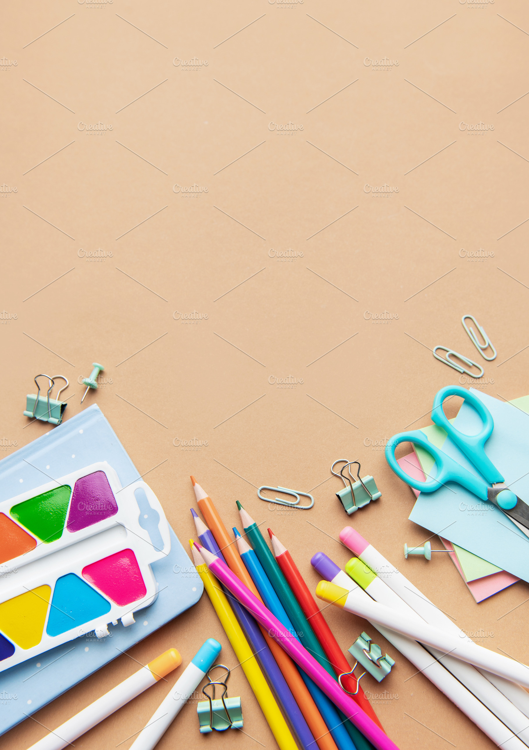 School supplies and art tools creating colorful education concep, a School & Education Photo by Olena Rudo