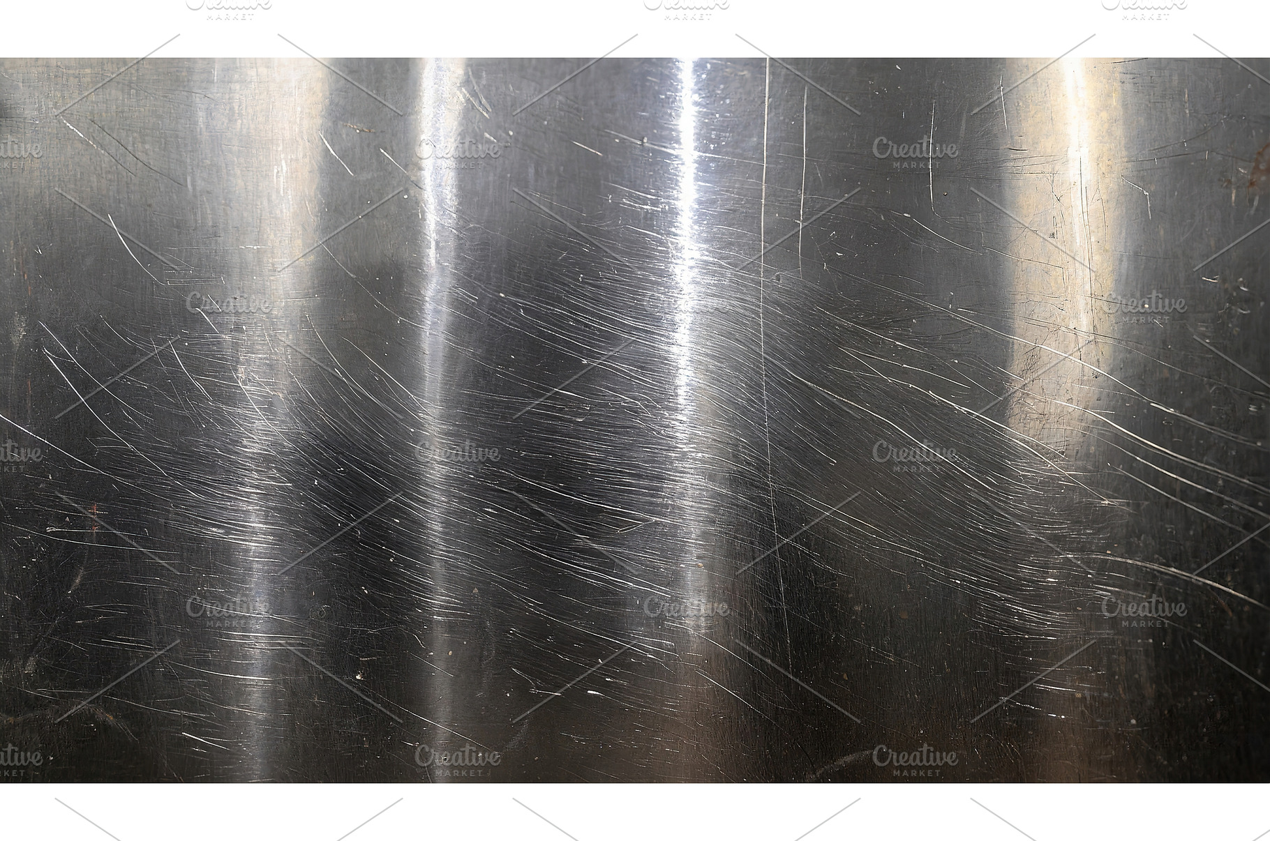 A close-up view of scratched metal, a Background Photo by Igor Tichonow