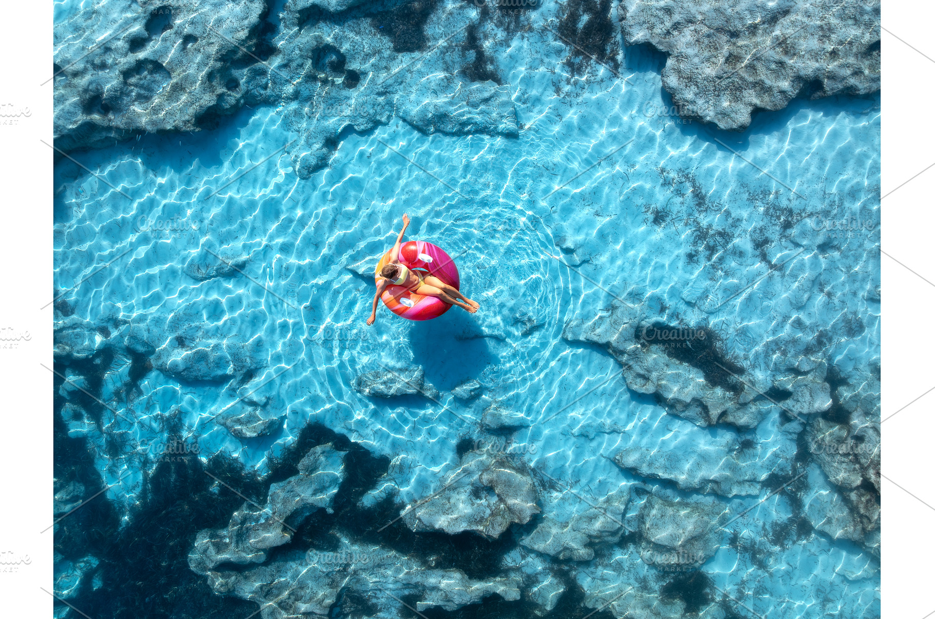 Aerialview of woman relaxing on pink, a Nature Photo by den-belitsky