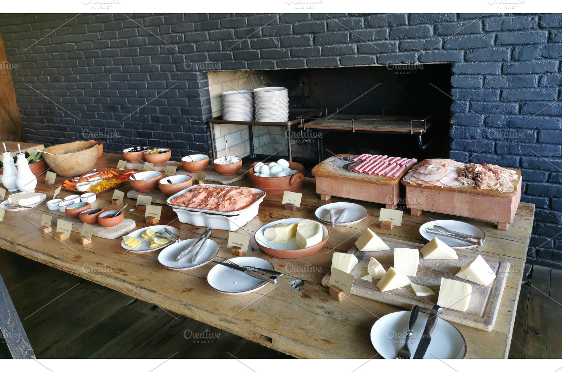 Buffet table with cheese, cold cut, a Food & Drink Photo by sceptical cactus