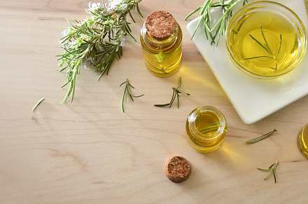 Detail of jars with rosemary extract on wooden tray top, a Health & Medical Photo by Davizro's Market