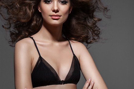Young sexy beautiful woman with fashion hairstyle featuring background