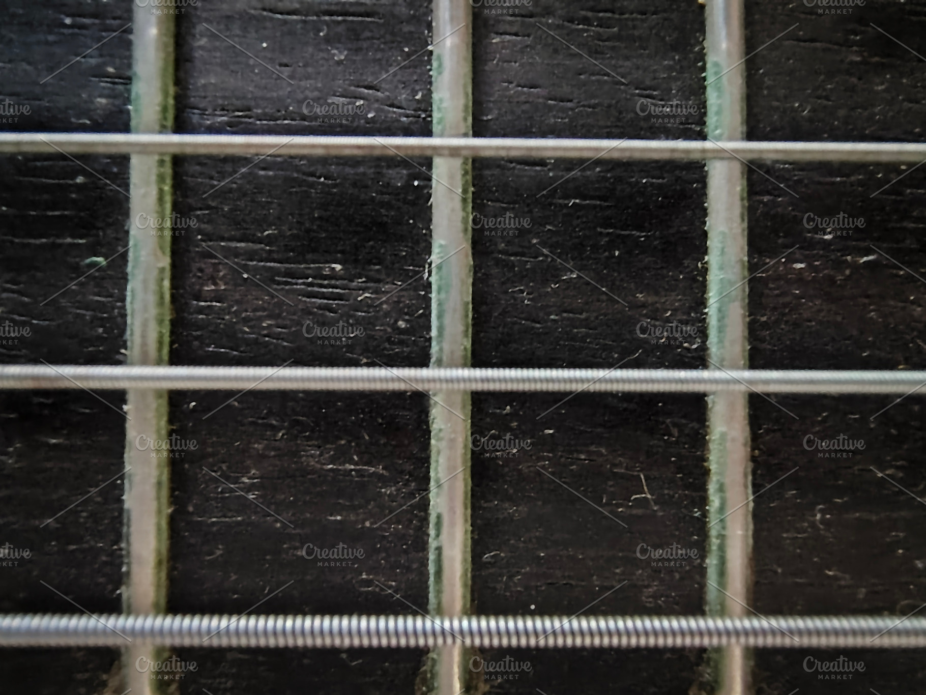Close-up, high-angle detail shot of a classic spanish guitar, an Arts & Entertainment Photo by DanFLCreativo