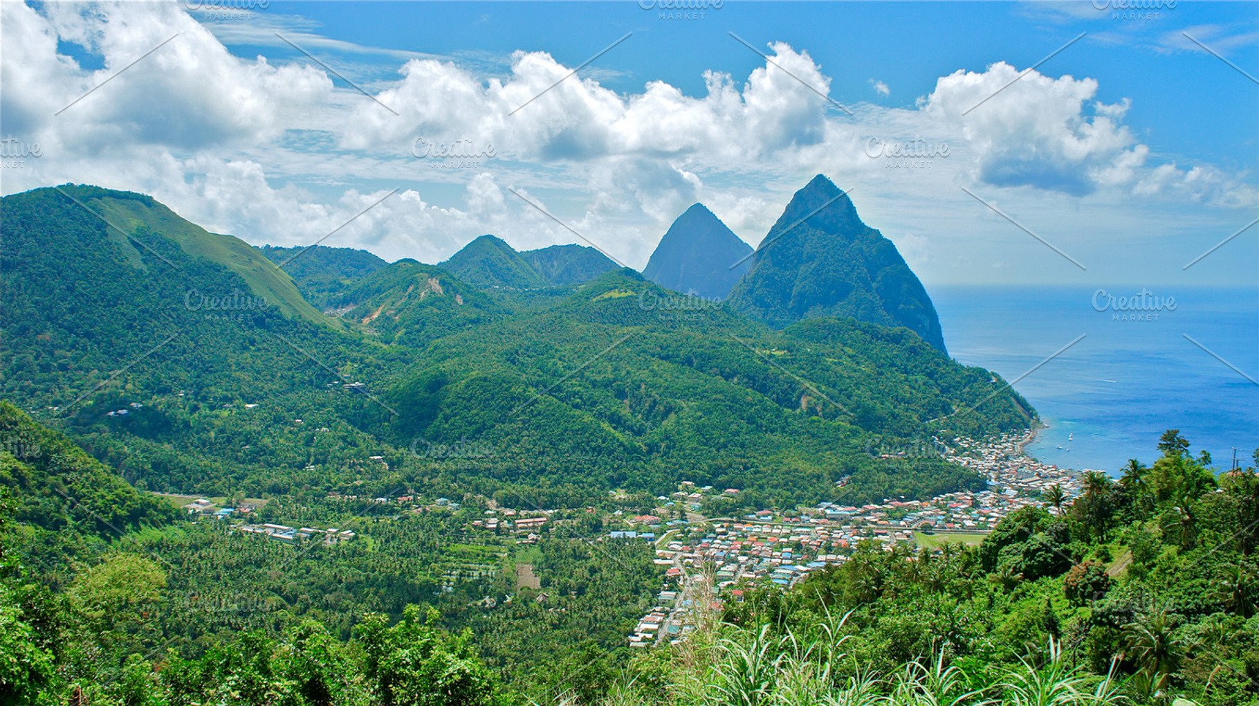 Lucias Pitons And Soufrière Containing Harbor Bay And Ocean