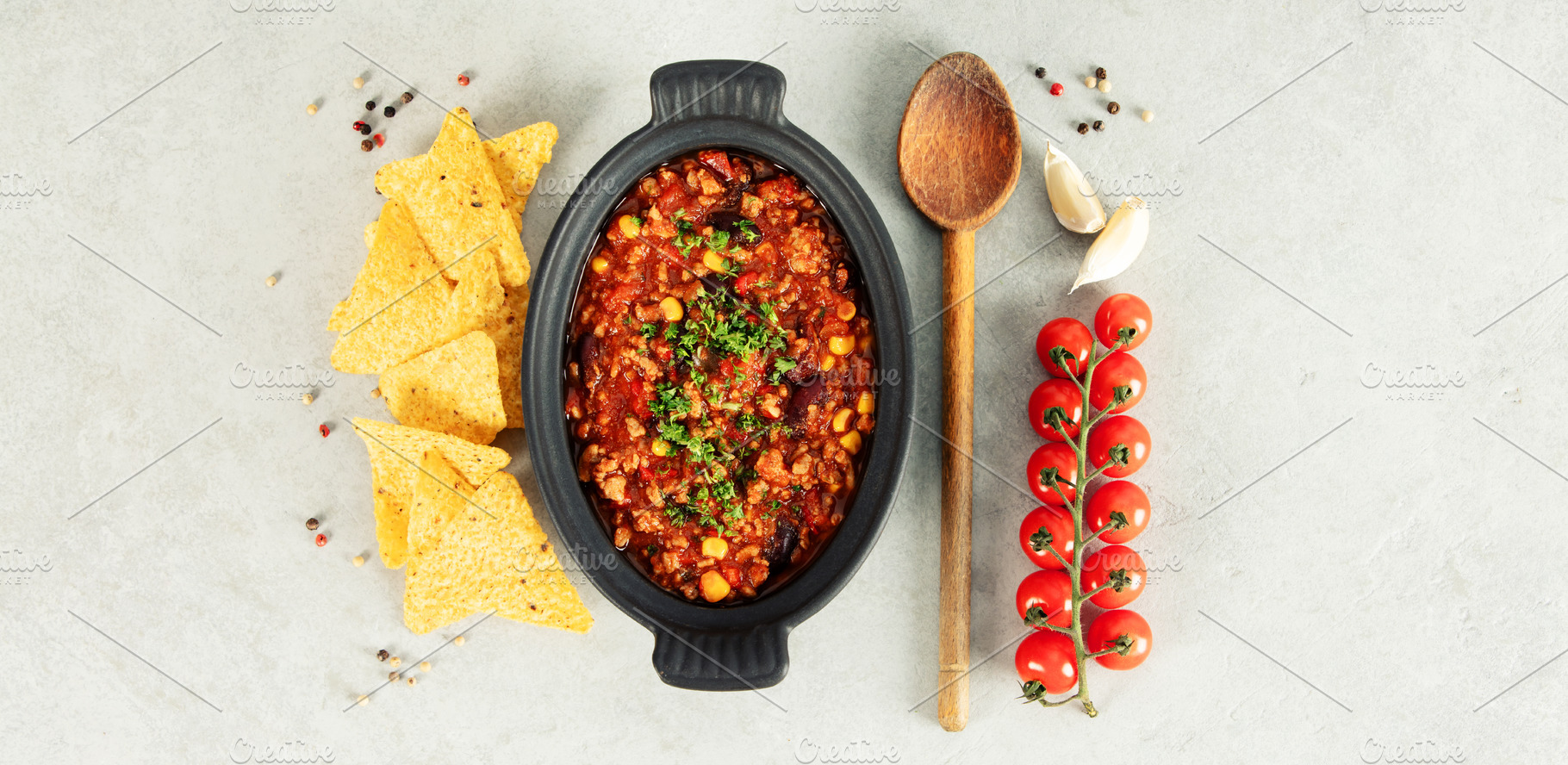 Mexican Chili Con Carne with Corn Chips, Peppers, and Tomatoes, a Food & Drink Photo by Natalia Klenova's Shop