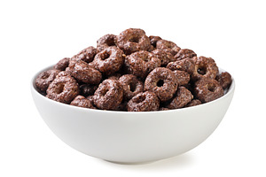 Chocolate corn rings in a plate on a, a Food & Drink Photo by innakreativ