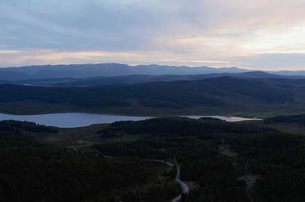 Dramatic sky and lakes in valley of Altai in evening time, a Nature Photo by TravelFlow