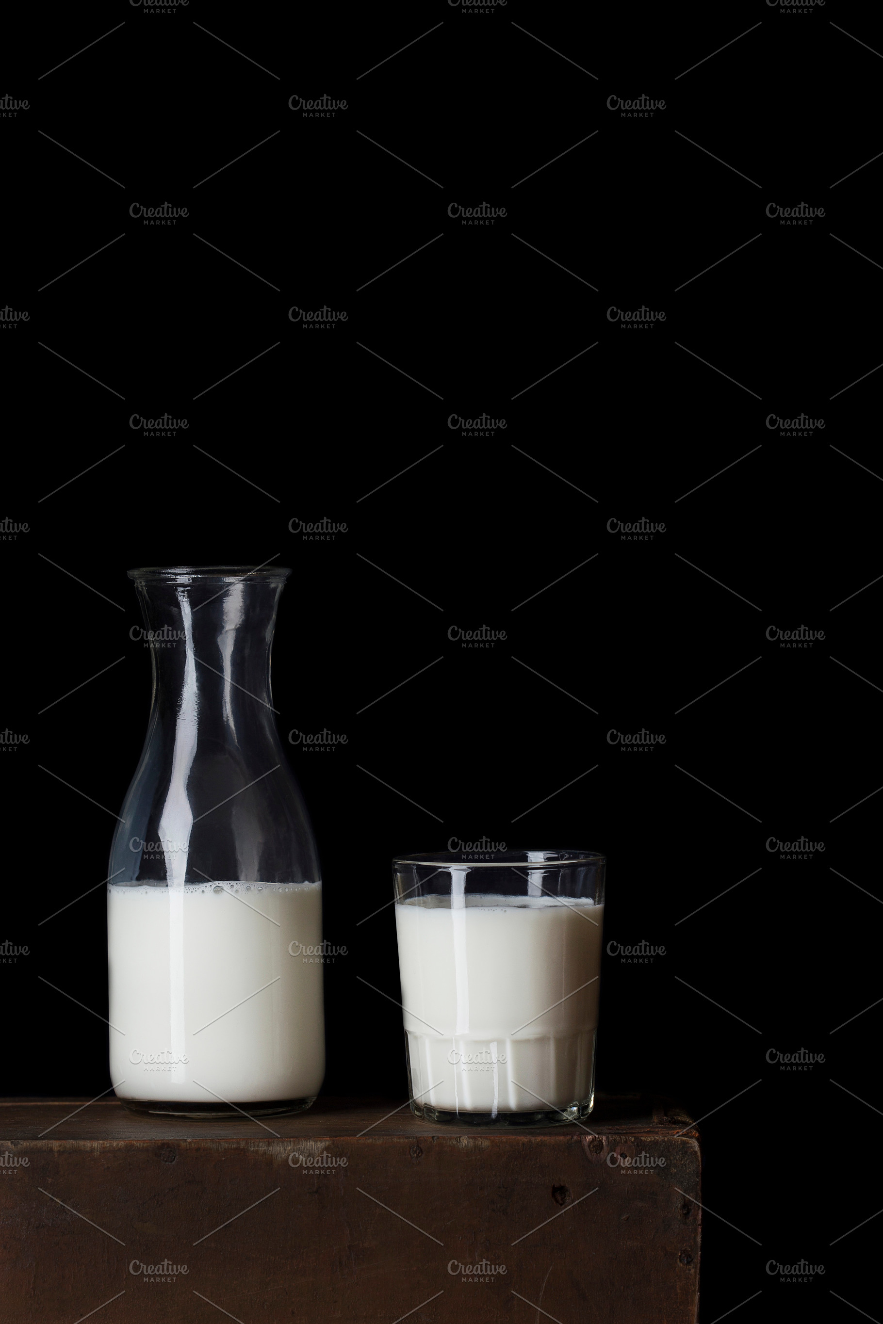 Milk bottle and milk glass stock photo containing background and beverage, a Food & Drink Photo by Marina_Pronina