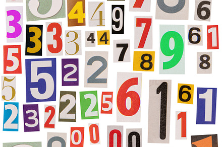 Numbers cut out from newspapers, a Photo by Grafvision photography