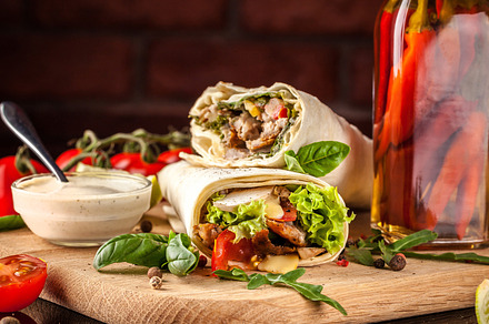 Mexican cuisine burrito with chicke containing burrito, food, and mexican