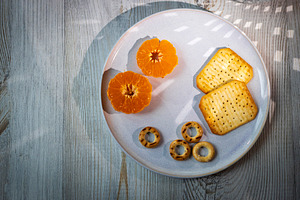 Top-down view of a plate with tanger, a Food & Drink Photo by Imaginarium
