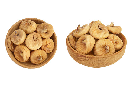 dried figs in wooden bowl isolated, a Food & Drink Photo by NataPhoto