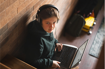 Teenager girl with laptop in, a School & Education Photo by MAnuta