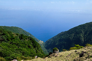 Scenic view over green Levada Nova hills into the blue Atlantic from Madeira Po, a Photo by AS photostudio
