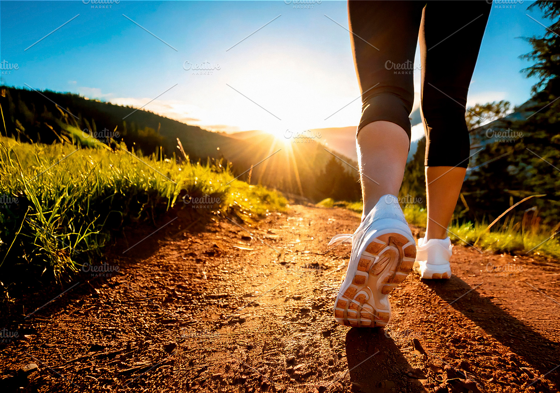 Detail of woman's legs running through the field at dawn, a Sports & Recreation Photo by Davizro's Market