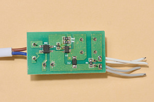 Green electronic board with components and some wires placed on, a Technology Photo by ndanko