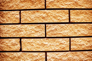 Yellow grunge texture of brickwall, a Photo by saiko3p