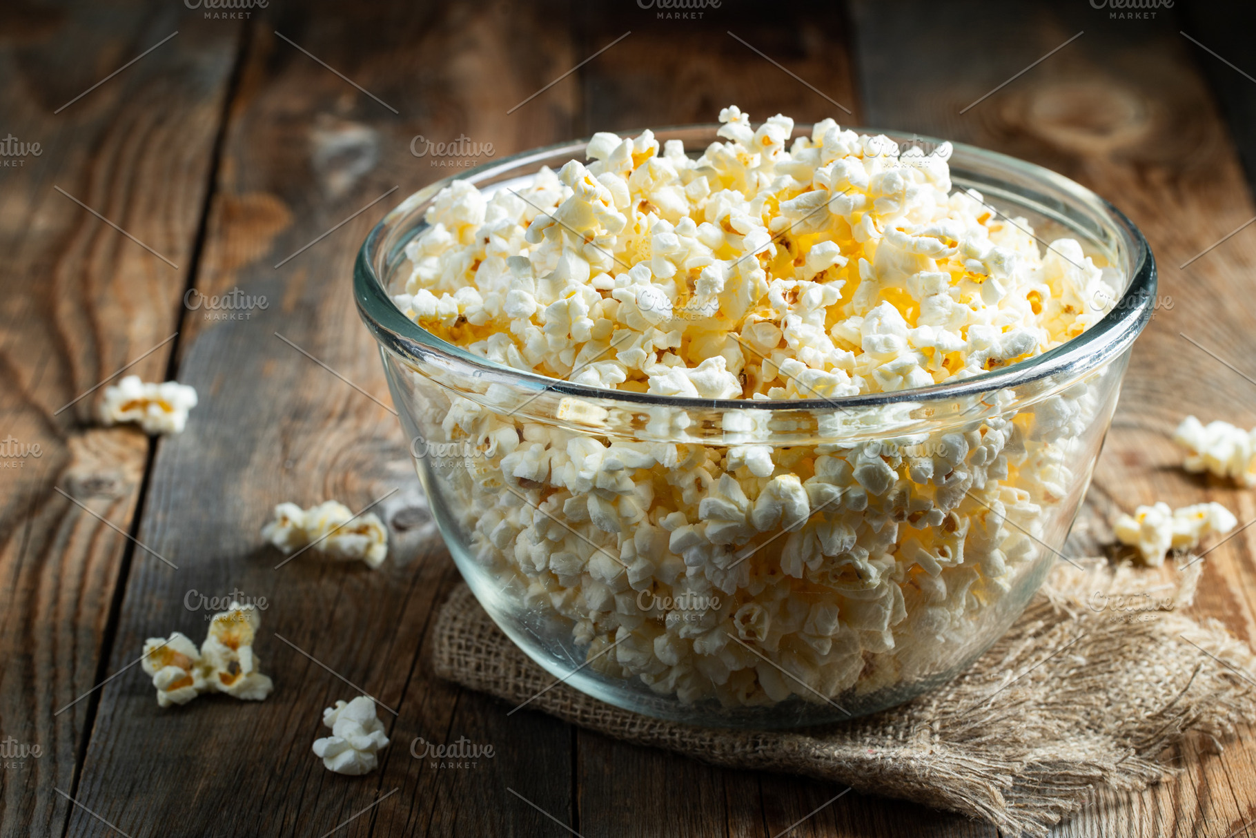 Popcorn on wood color background.Food and snack concepts ideas.Minimal style to, a Food & Drink Photo by Budarinphoto