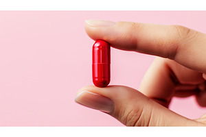 Close-up of a hand holding a red, a Health & Medical Photo by Sergey Kotenev