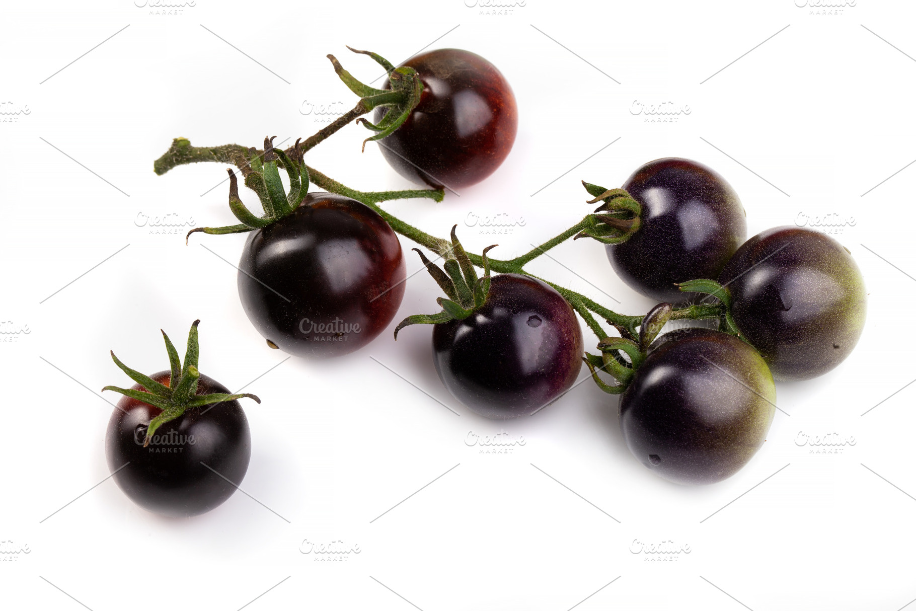 Assorted tomatoes and vegetables isolated on white background. P, a Nature Photo by eleana