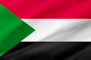 Sudan flag background with waving fabric texture