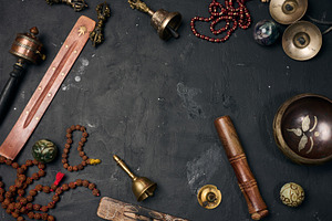 Tibetan singing bowl, wooden resonator, ritual vajras, bell, pra, a Background Photo by ndanko