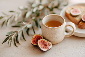 Delightful breakfast with sourdough toast and fresh figs served in a cozy setti, a Food & Drink Photo by AlyaAnd