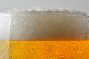 Mouth of a glass of beer with foam isolated background, a Food & Drink Photo by Davizro's Market