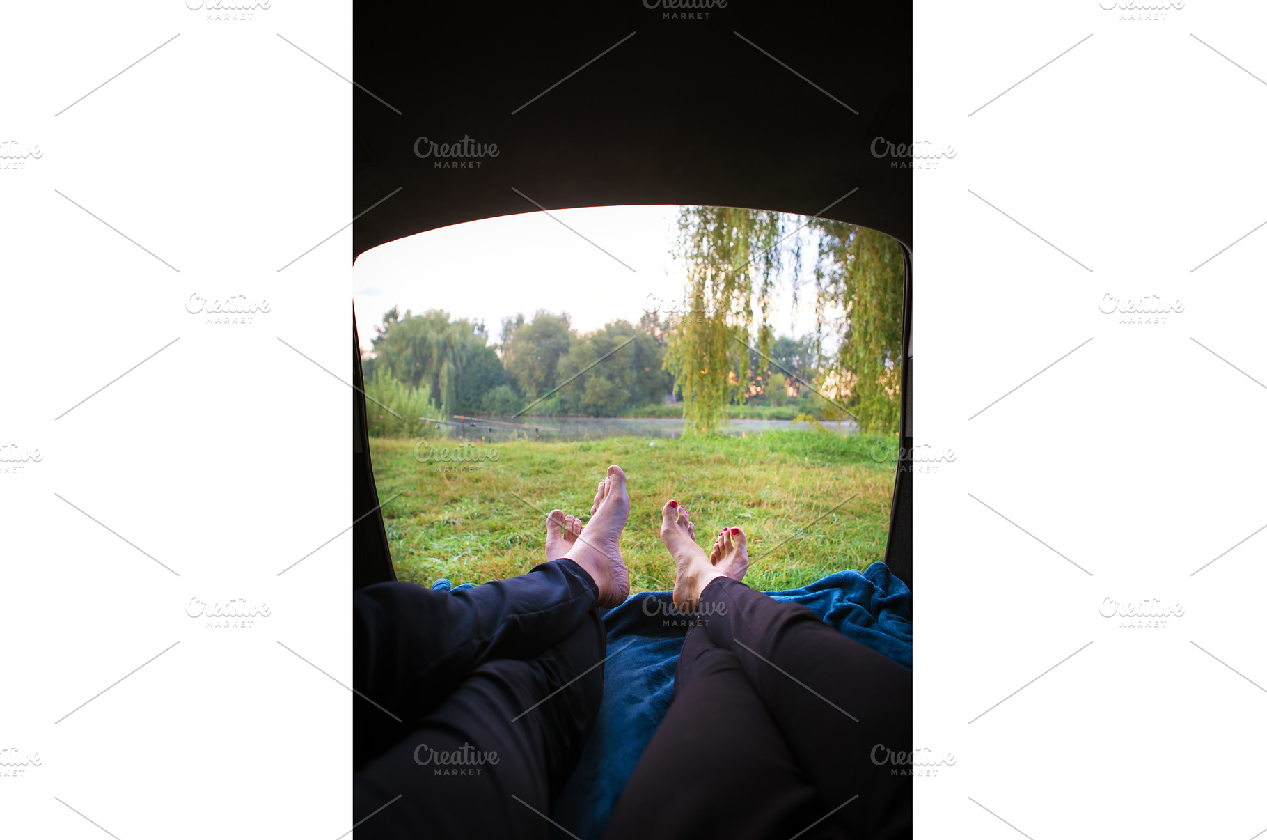 Man and woman relaxing in the trunk, a Person Photo by Artsaba Family