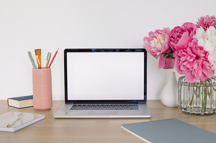 Home office desk with peonies