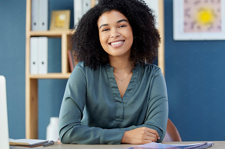 Black woman afro, portrait smile and management with vision, ambition or career success for design at the office. Confident African American female designer smiling for successful marketing business, a Photo by Peopleimages.com