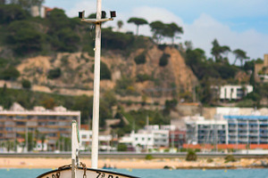 Boat Anchored on Sunny Beach
