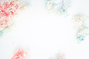 Flowers composition. Pattern made of pastel blue and pink flower