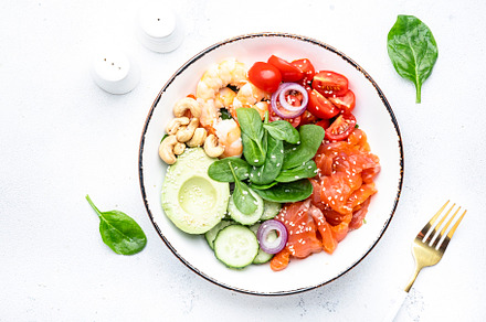 Keto salad with spinach, salmon, shrimp, avocado, cucumber, toma, a Food & Drink Photo by 5PH