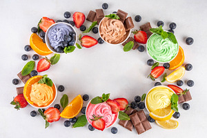 Frozen yogurt assortment. Soft creamy ice cream cups, a Food & Drink Photo by Rimma