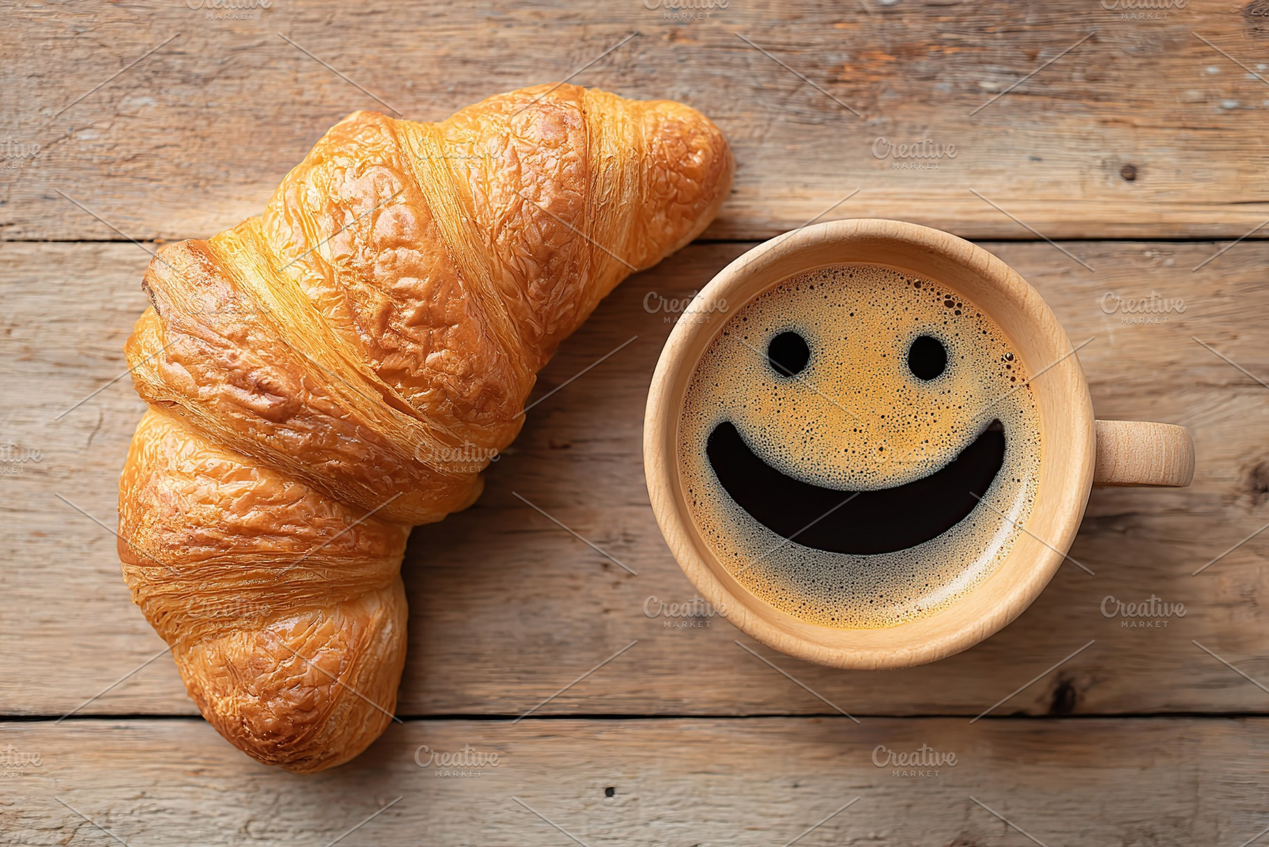 Coffee cup shaped like a smile beside a buttery croissant on a rustic wooden ta, a Food & Drink Photo by AlyaAnd
