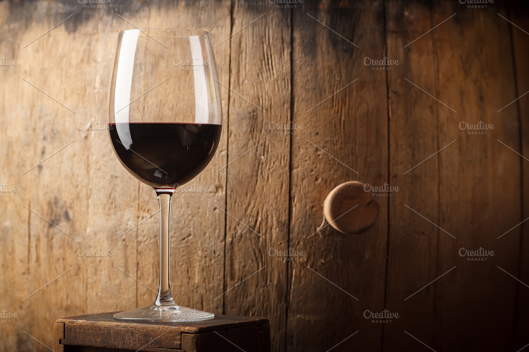 Red wine near a barrel featuring alcohol, barrel, and cask, a Food & Drink Photo by Hidden Hallow