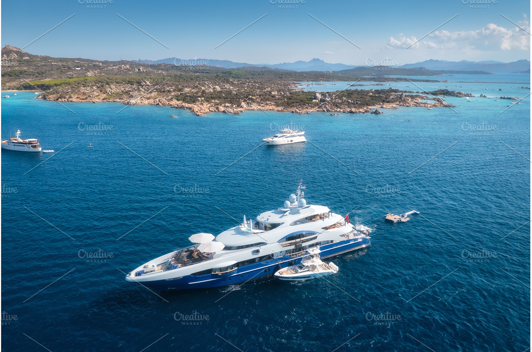 Aerial view of modern yacht sailing, a Nature Photo by den-belitsky