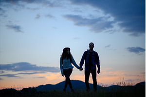 Travellers couple hiking on trail in, a Person Photo by HalfPoint