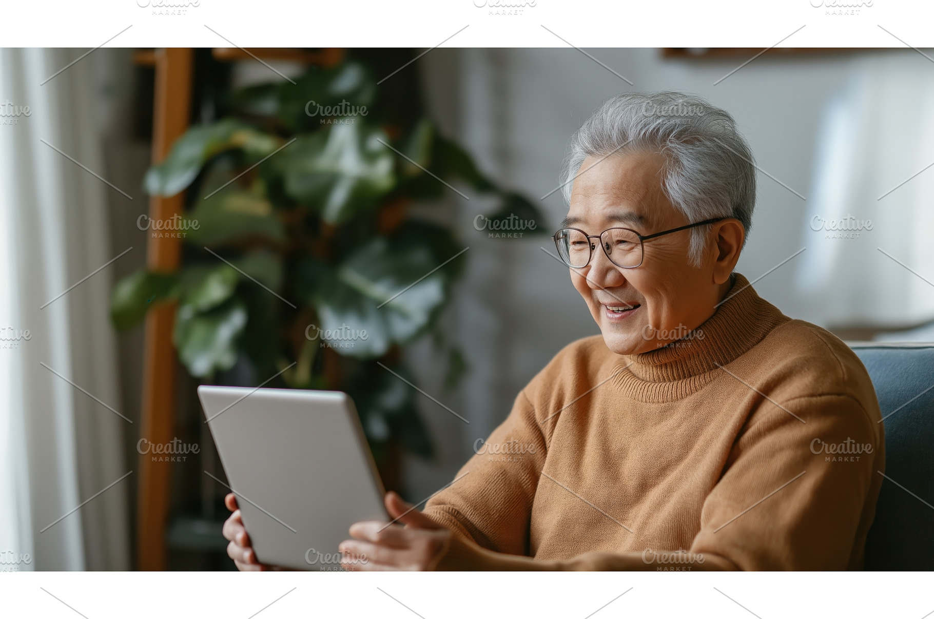 Elderly Asian man using a digital, a Person Photo by Sergey Kotenev