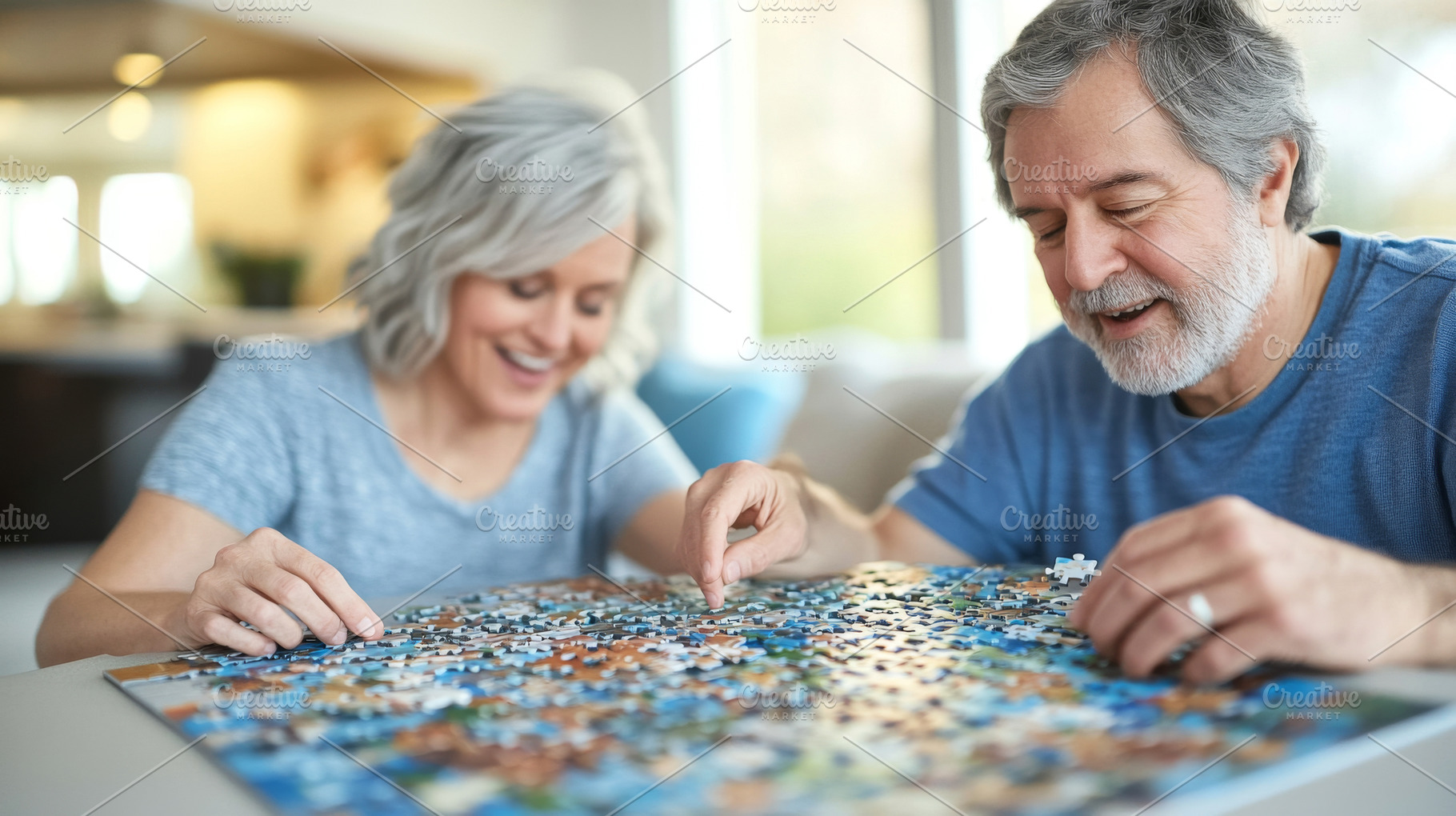 Middle age couple solving puzzle at, a Photo by Dvoevnore photos