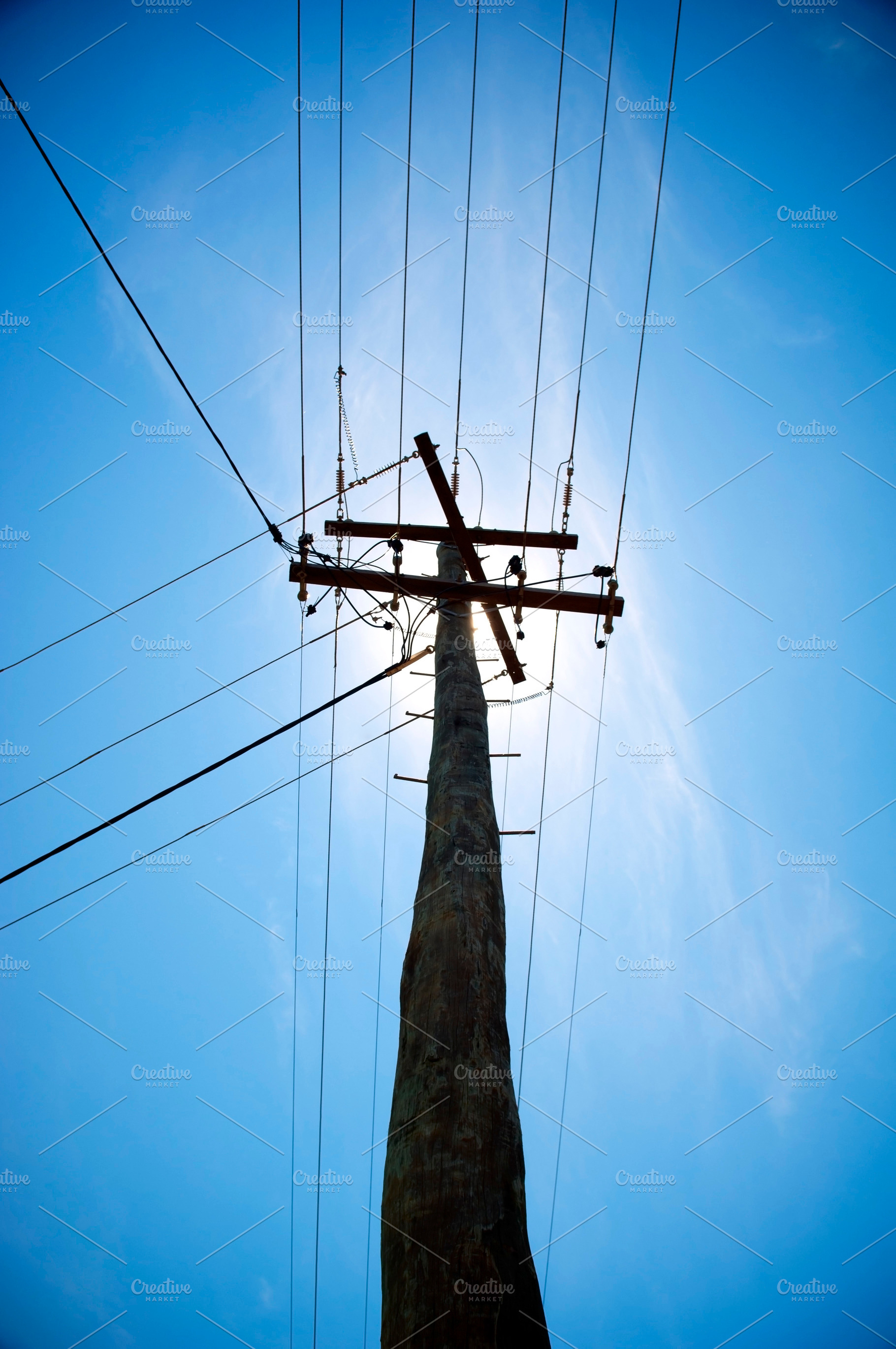 Powerline Overhead Blue Sky, an Industrial Photo by THP Creative