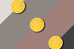 Lemon slices on color background, an Abstract Photo by BOOCYS