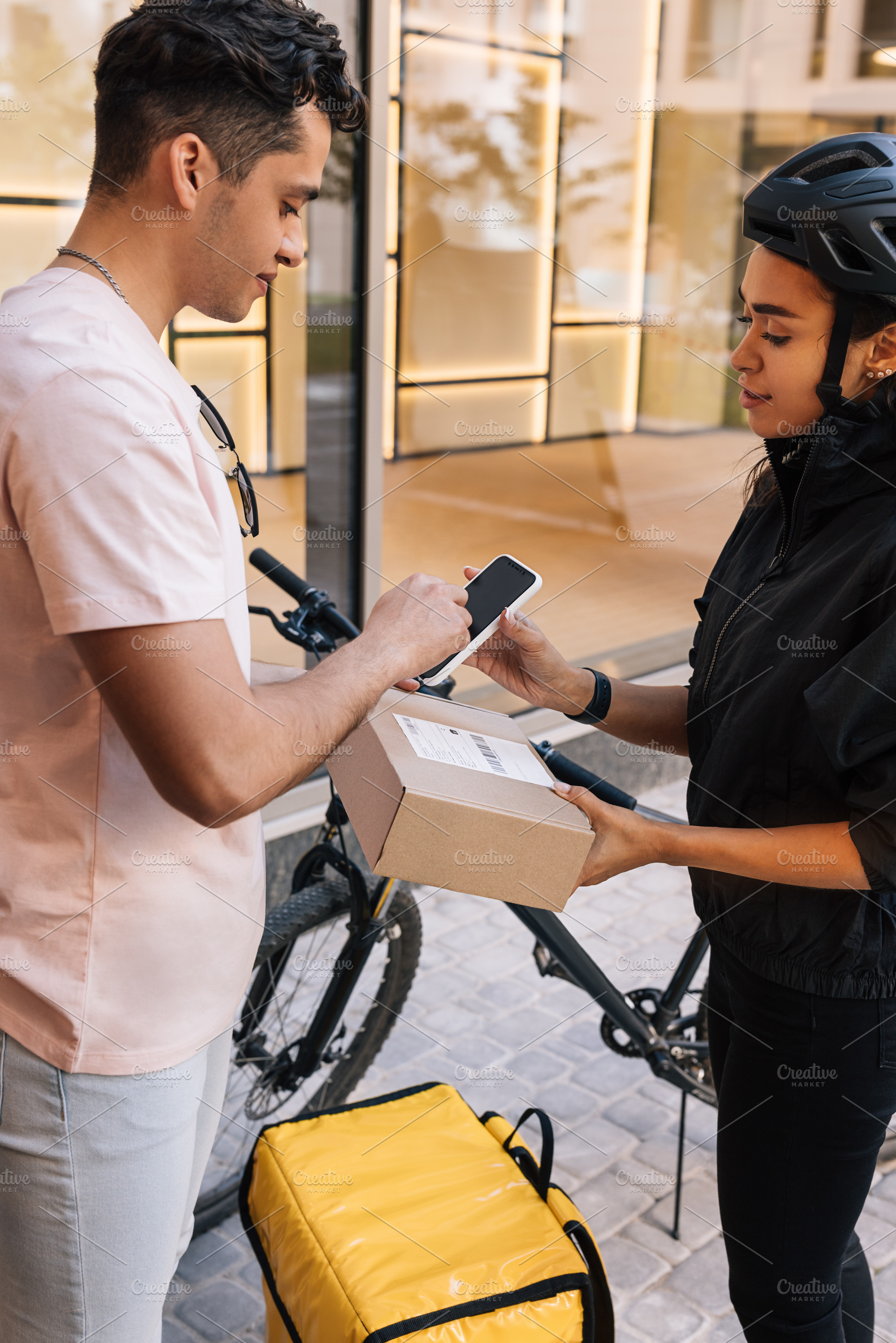 Young woman delivered a parcel, a Person Photo by Artem Varnitsin