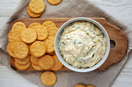 Homemade Caramelized Onion and Spinach Dip with Salty Round Crac, a Food & Drink Photo by LiudmylaChuhunova
