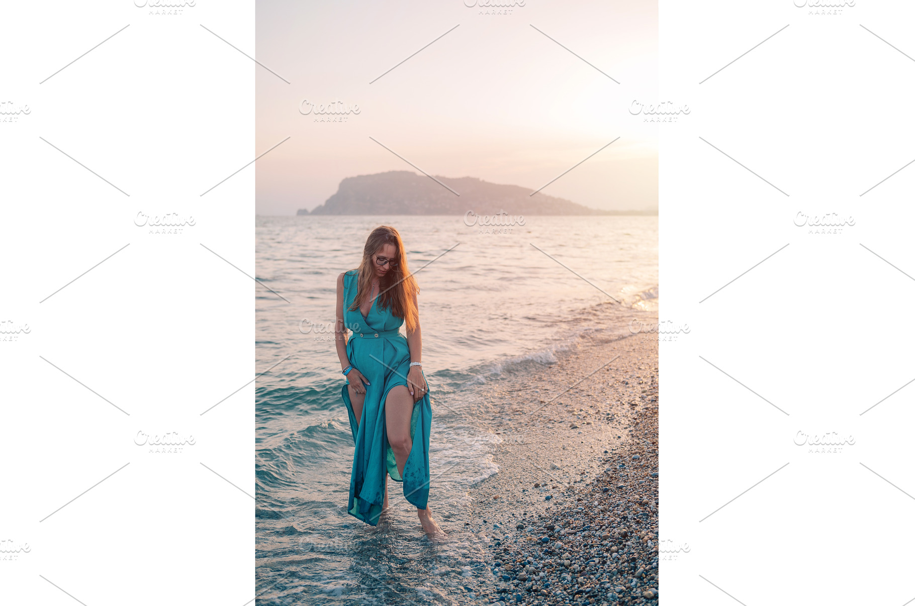 Woman in Flowing Dress on Seaside, a Person Photo by Jan Jack Russo Media