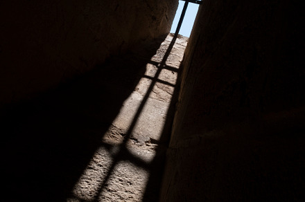 A Shadow in an old window castle, an Abstract Photo by RF Images