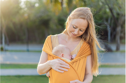 Mother holding her little baby in a