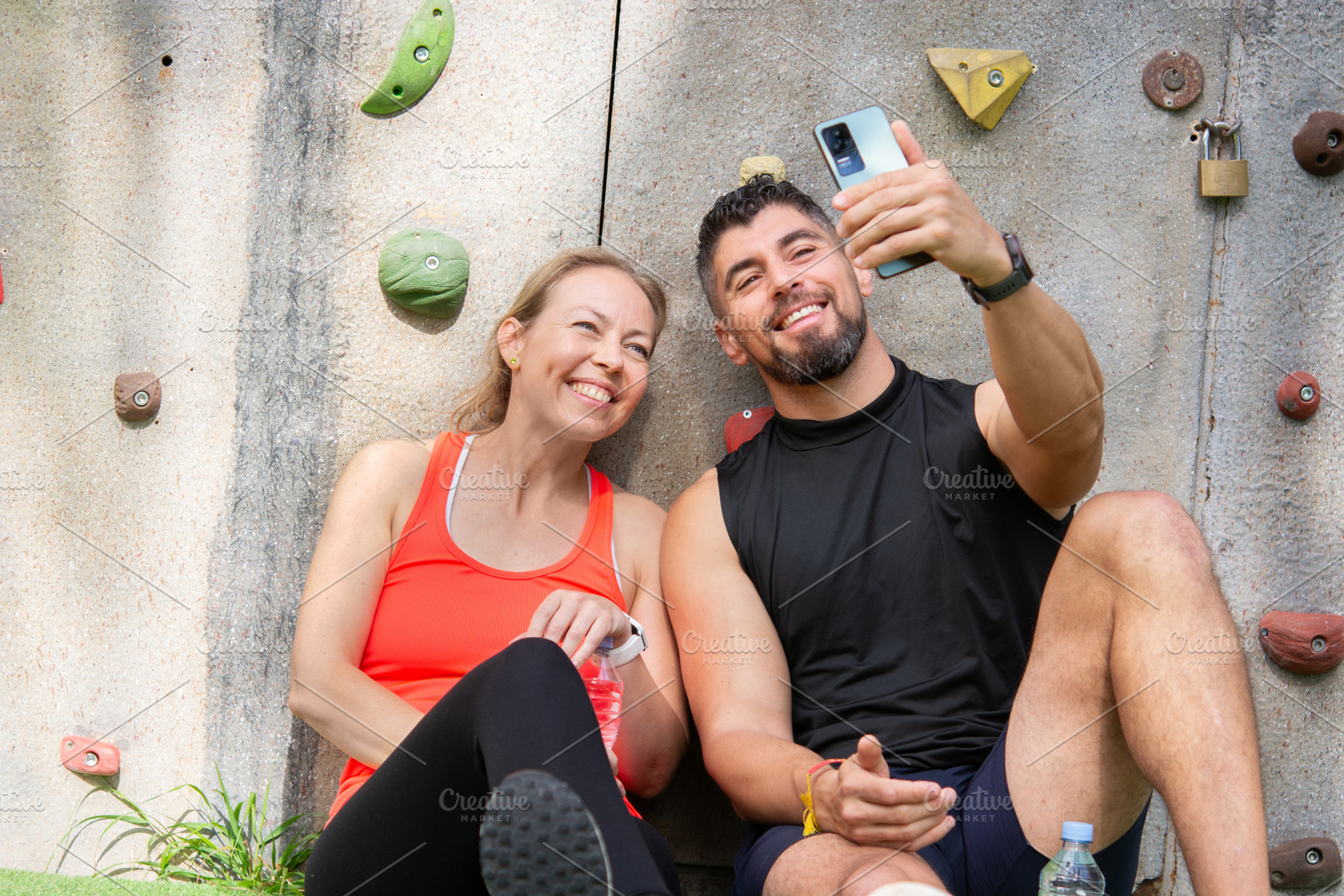 Happy sporty couple taking selfie after workout outdoors, active lifestyle conc, a Person Photo by etorres69