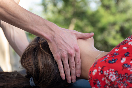 Male chiropractic working on a femal containing adult, alternative, and